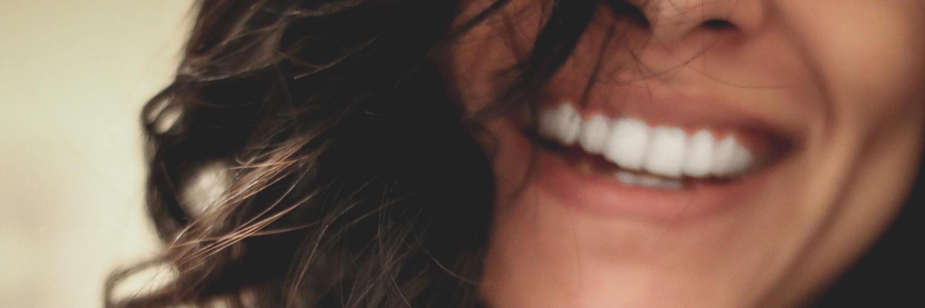 Woman smiling with straight teeth
