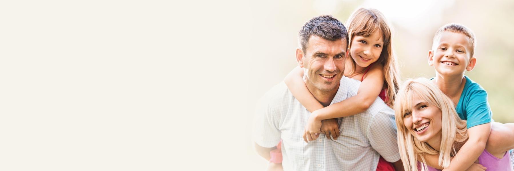 Family smiling & hugging l General dentist concord NH